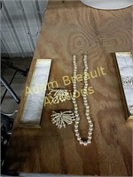 Pearl necklace and clip-on earrings