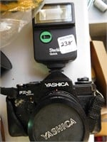 Yashica 35mm camera with flash and 2x converter