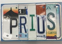 Sign, wooden/license plate Prius