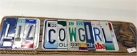 Sign wooden with rope border and license plate,