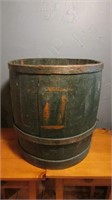 Old wooden trawler tub in green paint