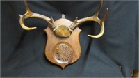 Mounted deer antler carved Indian chief