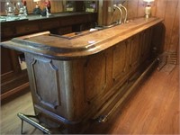 WOOD AND BRASS BAR WITH TAPS AND FOOT REST, OVER