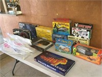 TABLE LOT OF BOARD GAMES, ACTION FIGURES AND MORE