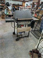 Gas grill with tank and side burner