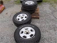SET OF 4 WHEELS 1 BFG TIRE AND 3 COOPER DISCOVER