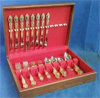 Silverware in wooden chest, gold plated