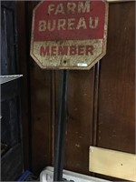 farm bureau and stop metal sign on post
