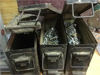 assorted hardware in metal ammo boxes
