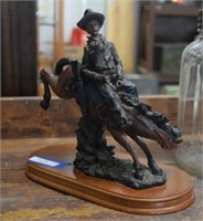 Figurine of a Cowboy on a Bucking Bronco