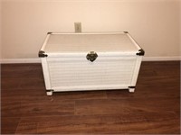 White wicker trunk that is about 32"L 17"W 12"deep