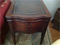 Mahogany, serpentine front, leather top end table