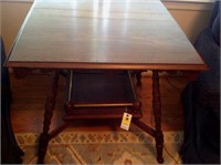 Game table with brass rail on shelf,
