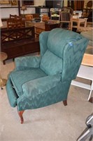 Green Upholstered Wingback Recliner