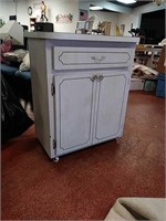 White wash rolling cabinet for the garage