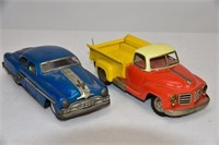 Two Friction Toy Autos