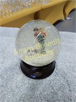 All wrapped up Norman Rockwell snow globe