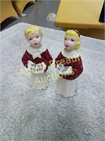 Two porcelain 6 inch singing figurines