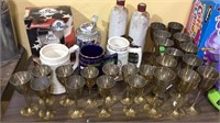 23 brass cups, Budweiser beer mug, 3 mugs and 2
