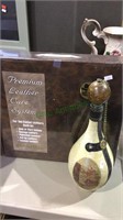 Leather covered wine bottle, & leather care kit