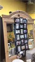 Large framed wood mirror, with a 21 collage frame,
