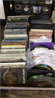 Box of music CDs, about half with cases , half