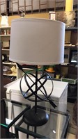 Metal sphere with an arrow table lamp, 29 inches