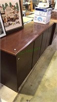 Office credenza with four legal file drawers and