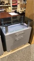 Modern file cabinet with the extra drawer glass