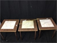 Three small wood tables used