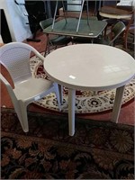 Plastic table with one chair