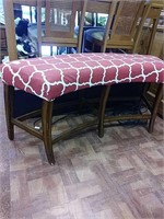 Curved red bench stool