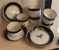 SET OF FITZ AND FLOYD TEACUPS AND SAUCERS