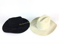 Two western hats