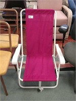 Folding pink metal beach chair