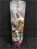 VERY LARGE LOT OF COSTUME JEWELRY IN VASE