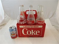 6 pack de Coca-Cola avec ses bouteilles