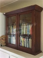 Antique wooden bookcase with glass doors