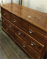 A beautiful solid cedar wood 7-drawer dresser with