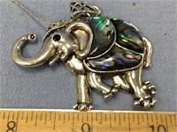 Silver alloy and abalone elephant pendent on a sil