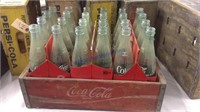 Wooden Coca Cola crate with glass Coke bottles