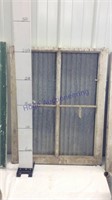 Wooden window frame with decorative tin