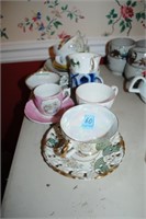 COLLECTION OF CUPS AND SAUCERS