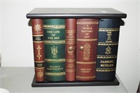 CD CASE THAT HAS APPEARANCE OF LINE OF BOOKS WITH