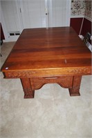 ANTIQUE CHERRY DINING TABLE W/CARVED SKIRT AND