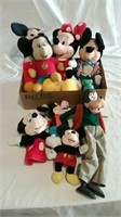 Mickey Mouse stuffed animals and Goofy puppet