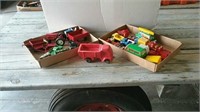Toy trucks and cars and tractors