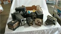 Variety of cameras, binoculars and accessories