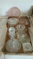 Two boxes of pink and crystal glass