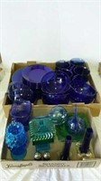 Two boxes of blue glass dinnerware and